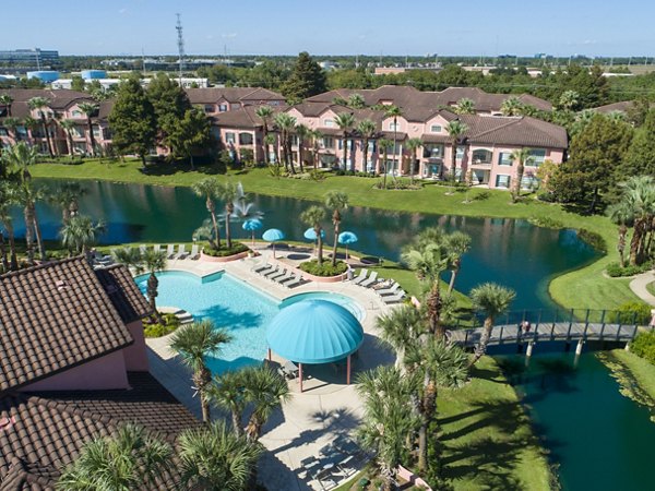 Sparkling outdoor pool at Las Palmas Apartments offering relaxation and luxury for residents