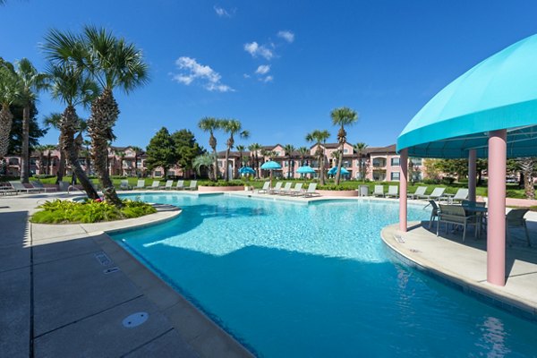 Resort-style pool at Las Palmas Apartments offering luxurious relaxation