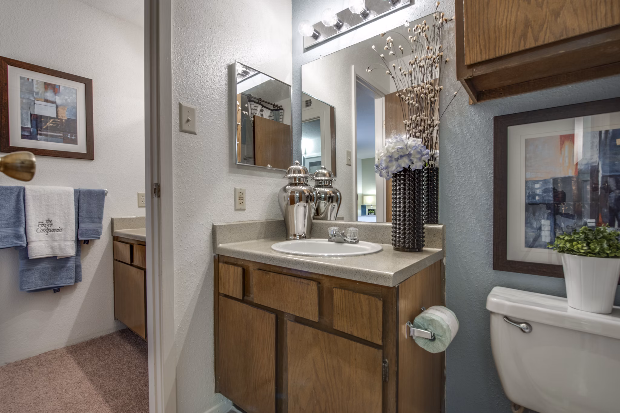 Modern bathroom with sleek fixtures in Sabo Village Apartments luxury floor plan