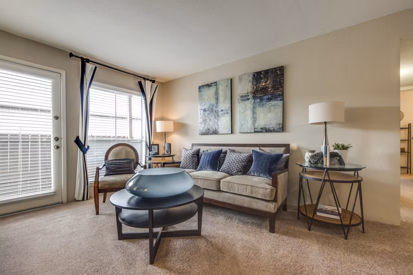 Contemporary living room with stylish decor in Sabo Village Apartments, offering luxury living spaces in a serene environment