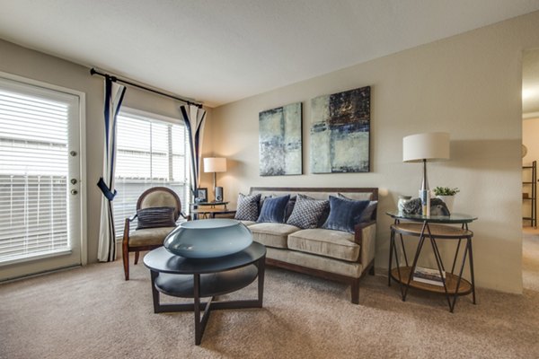 Contemporary living room with stylish decor in Sabo Village Apartments, offering luxury living spaces in a serene environment