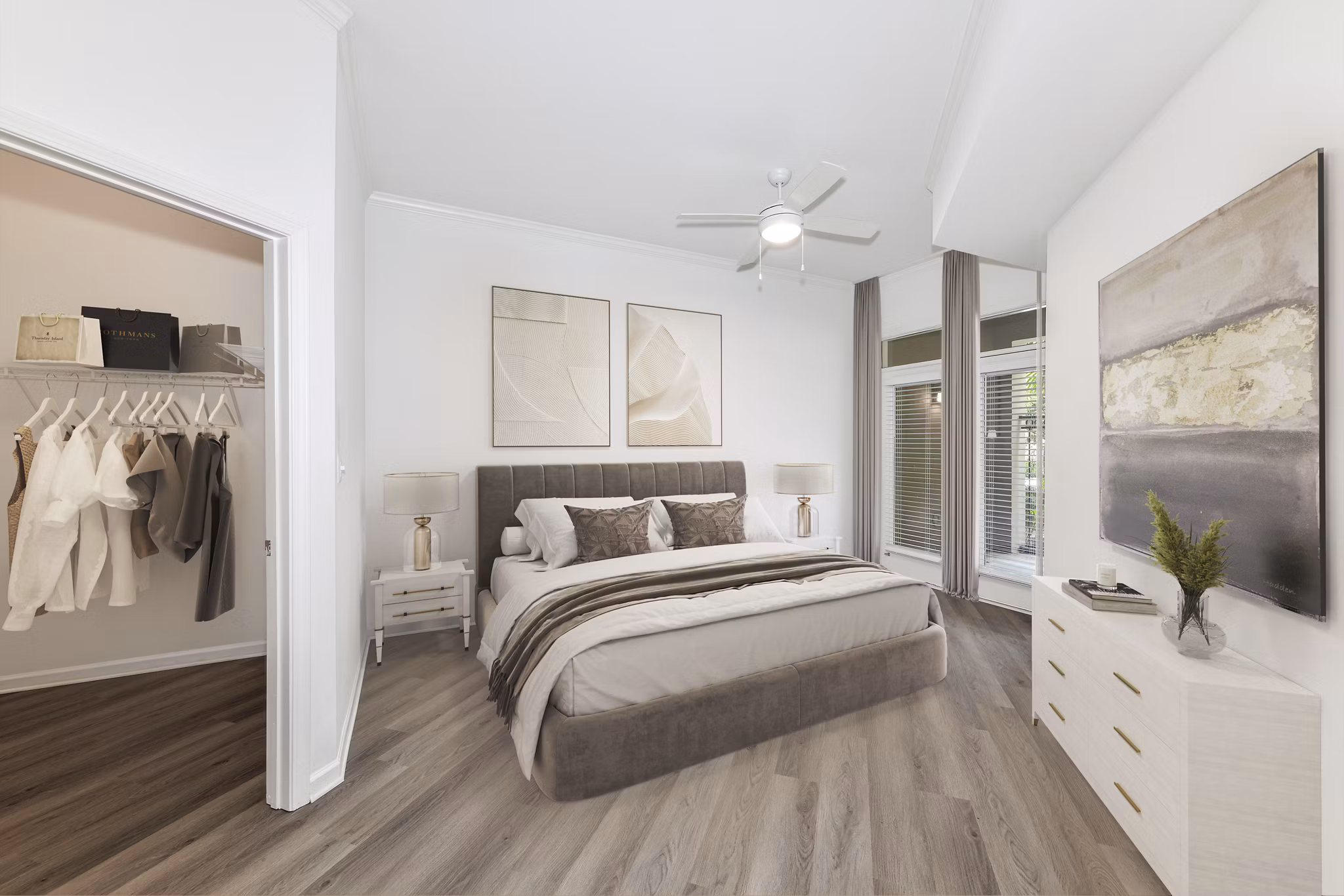 Stylish bedroom with modern furnishings at Kingsboro Luxury Apartments