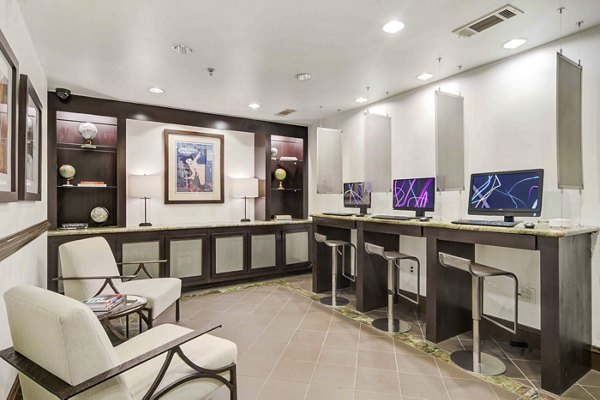 Business center with modern workstations at Kingsboro Luxury Apartments Perfect for remote work and professional meetings