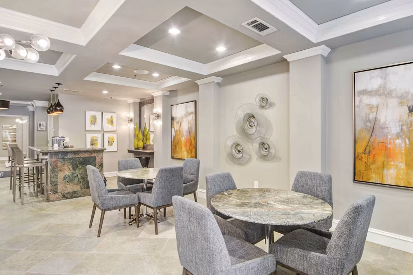 Elegant clubhouse with plush seating and modern decor at Kingsboro Luxury Apartments