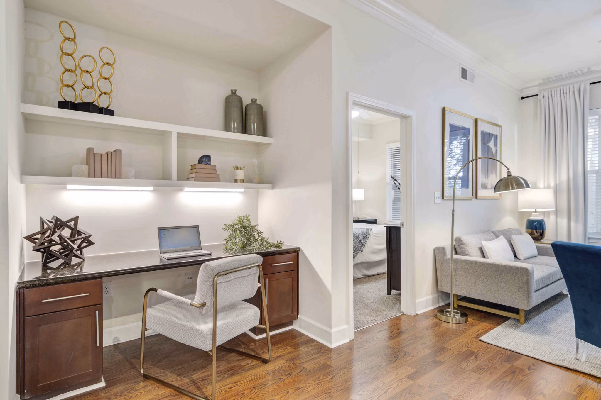 Home office with modern furnishings and natural light at Kingsboro Luxury Apartments