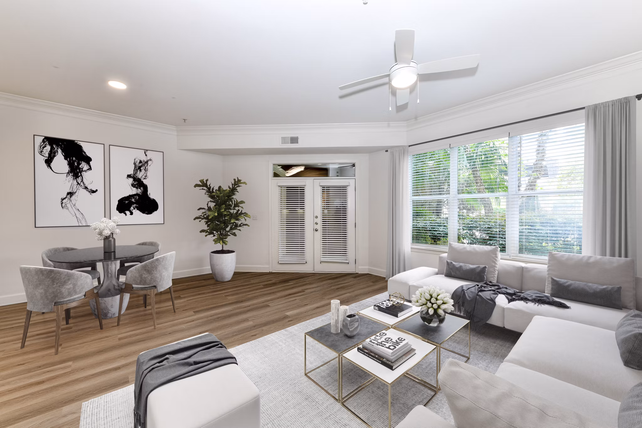 Spacious living room with modern furnishings at Kingsboro Luxury Apartments