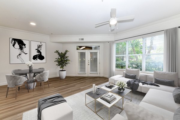 Spacious living room with modern furnishings at Kingsboro Luxury Apartments