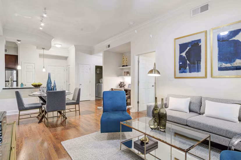 Cozy living room with elegant furnishings at Kingsboro Luxury Apartments