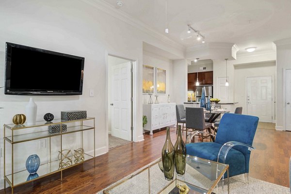 Cozy living room with modern decor at Kingsboro Luxury Apartments