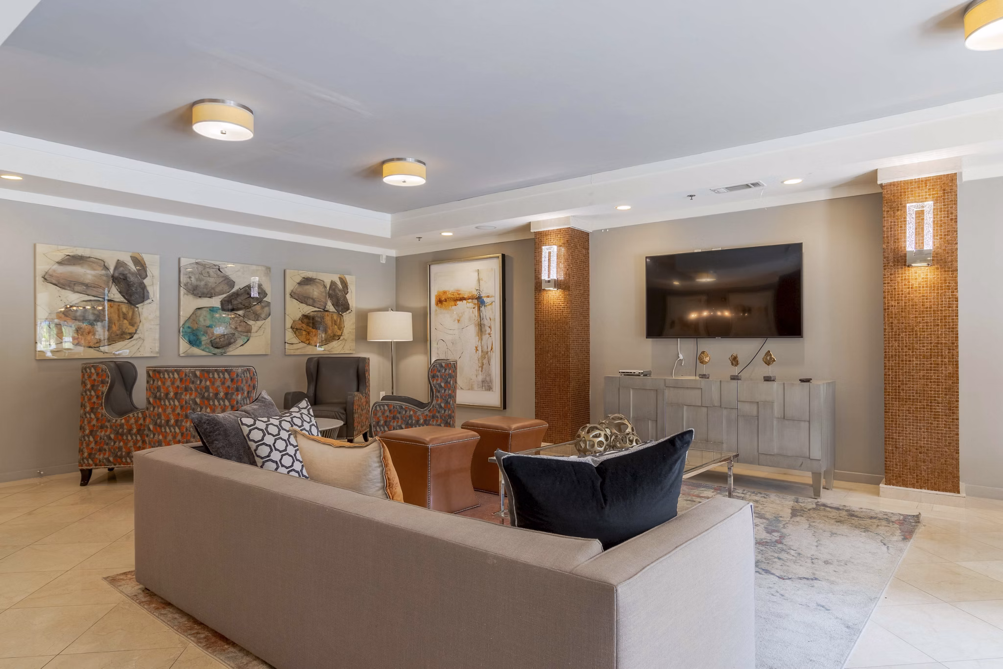 Elegant clubhouse at Peachtree Dunwoody Place Apartments with modern decor and ample seating areas for community gatherings