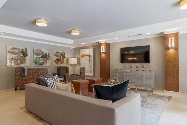 Elegant clubhouse at Peachtree Dunwoody Place Apartments with modern decor and ample seating areas for community gatherings