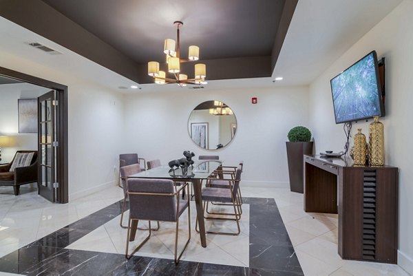 Clubhouse amenities at Peachtree Dunwoody Place Apartments featuring a modern lounge and meeting space