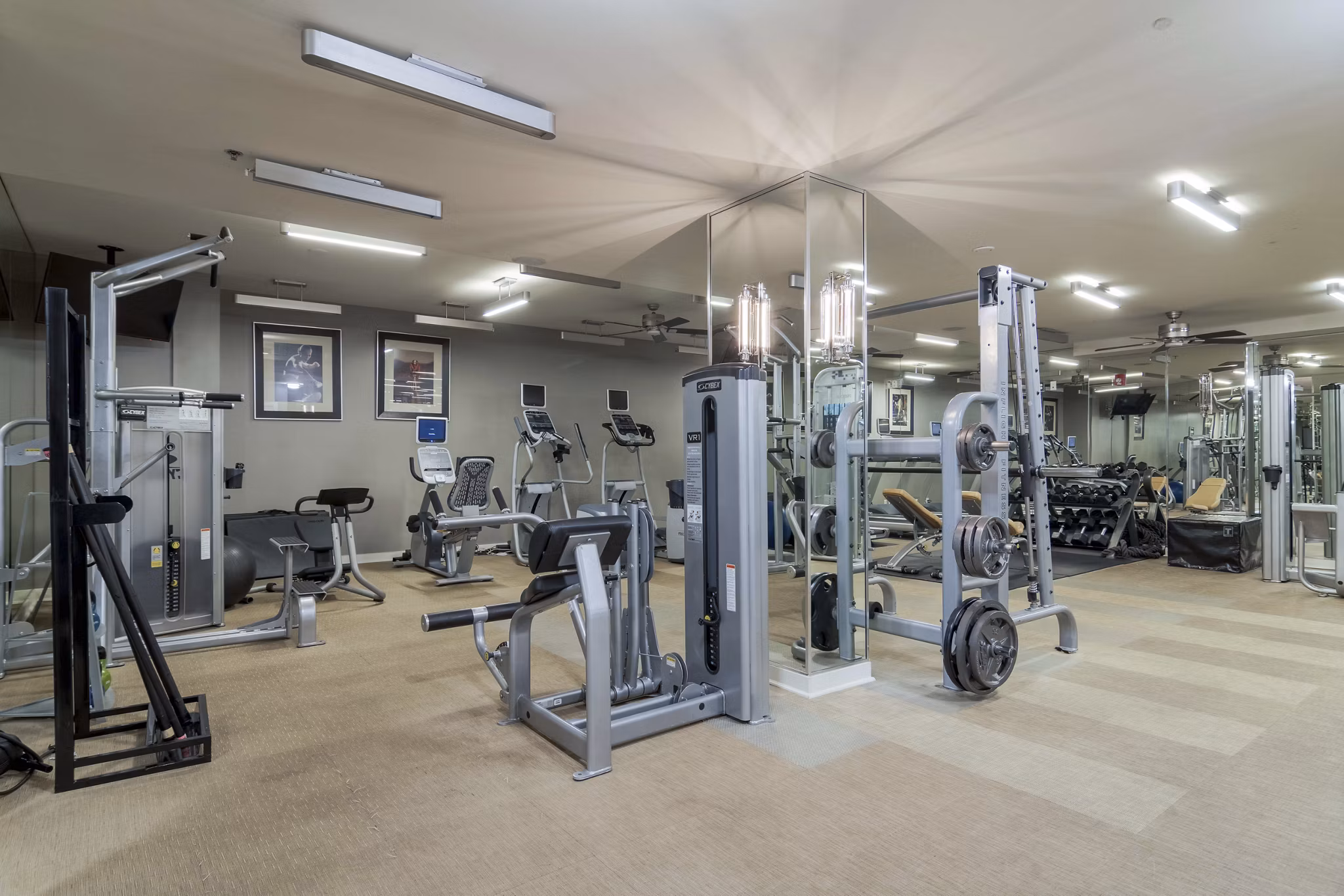 State-of-the-art fitness center at Peachtree Dunwoody Place Apartments with modern equipment for an enhanced workout experience