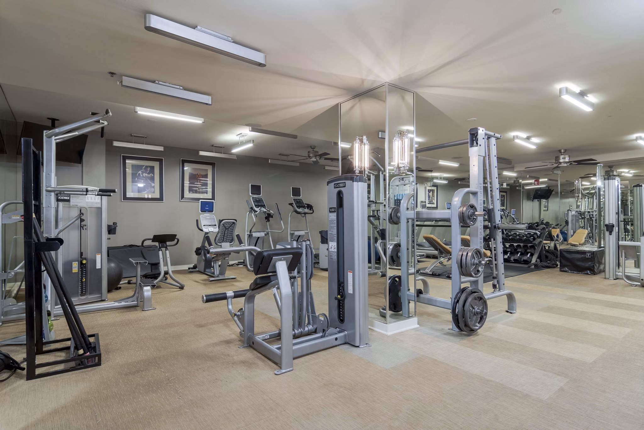 State-of-the-art fitness center at Peachtree Dunwoody Place Apartments with modern equipment for an enhanced workout experience