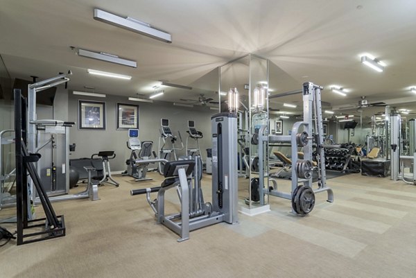 State-of-the-art fitness center at Peachtree Dunwoody Place Apartments with modern equipment for an enhanced workout experience