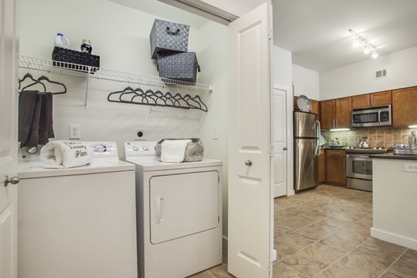 laundry room at Peachtree Dunwoody Place Apartments