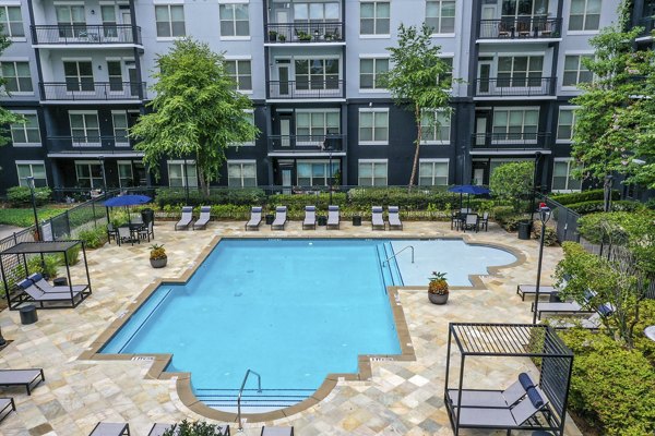 Resort-style pool at Peachtree Dunwoody Place Apartments, offering luxury leisure in Atlanta