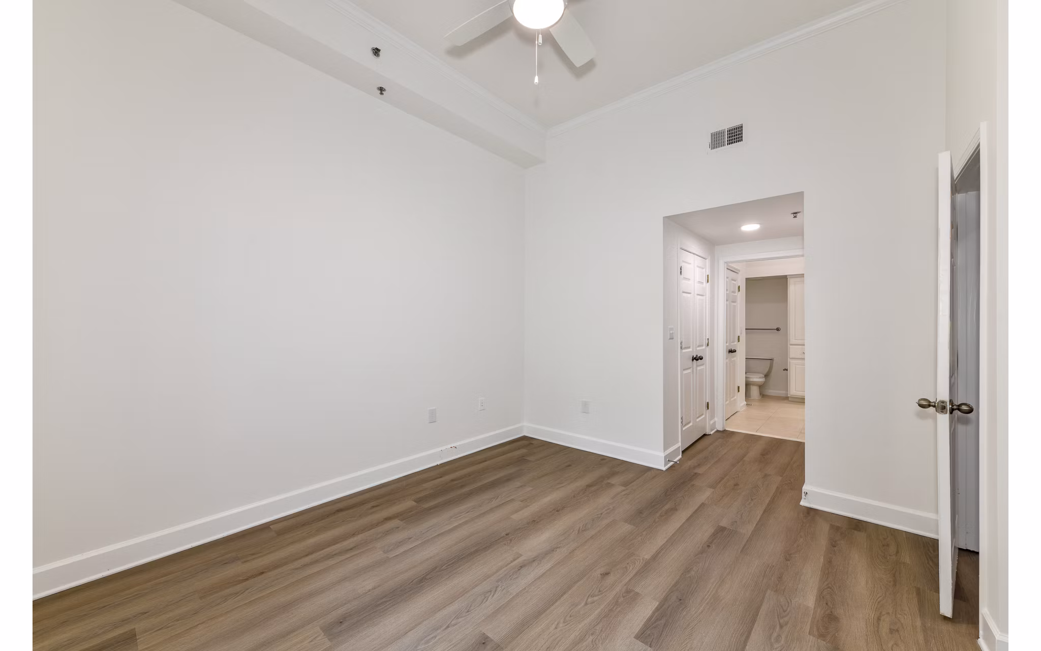 Cozy bedroom with modern decor at Phipps Place Apartments