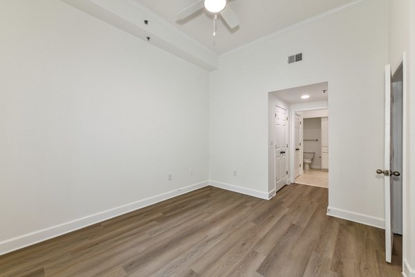 Cozy bedroom with modern decor at Phipps Place Apartments