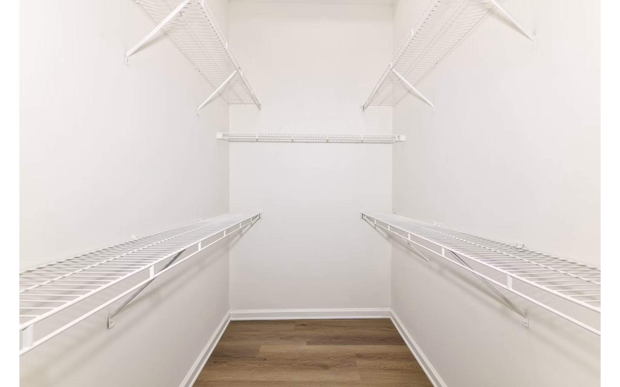 Spacious bedroom closet with built-in shelves at Phipps Place Apartments, luxury living in a prime location