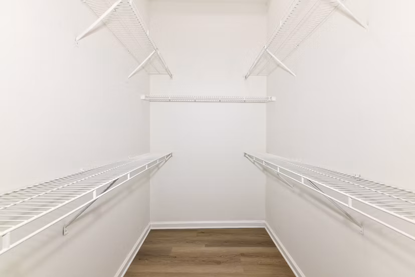 Spacious bedroom closet with built-in shelves at Phipps Place Apartments, luxury living in a prime location