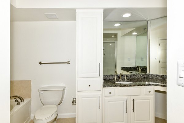 Modern bathroom featuring sleek fixtures and a glass shower at Phipps Place Apartments, luxury living in a prime location