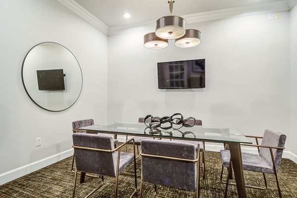 Phipps Place Apartments: Modern home office with sleek furniture and abundant natural light in a luxury Atlanta apartment