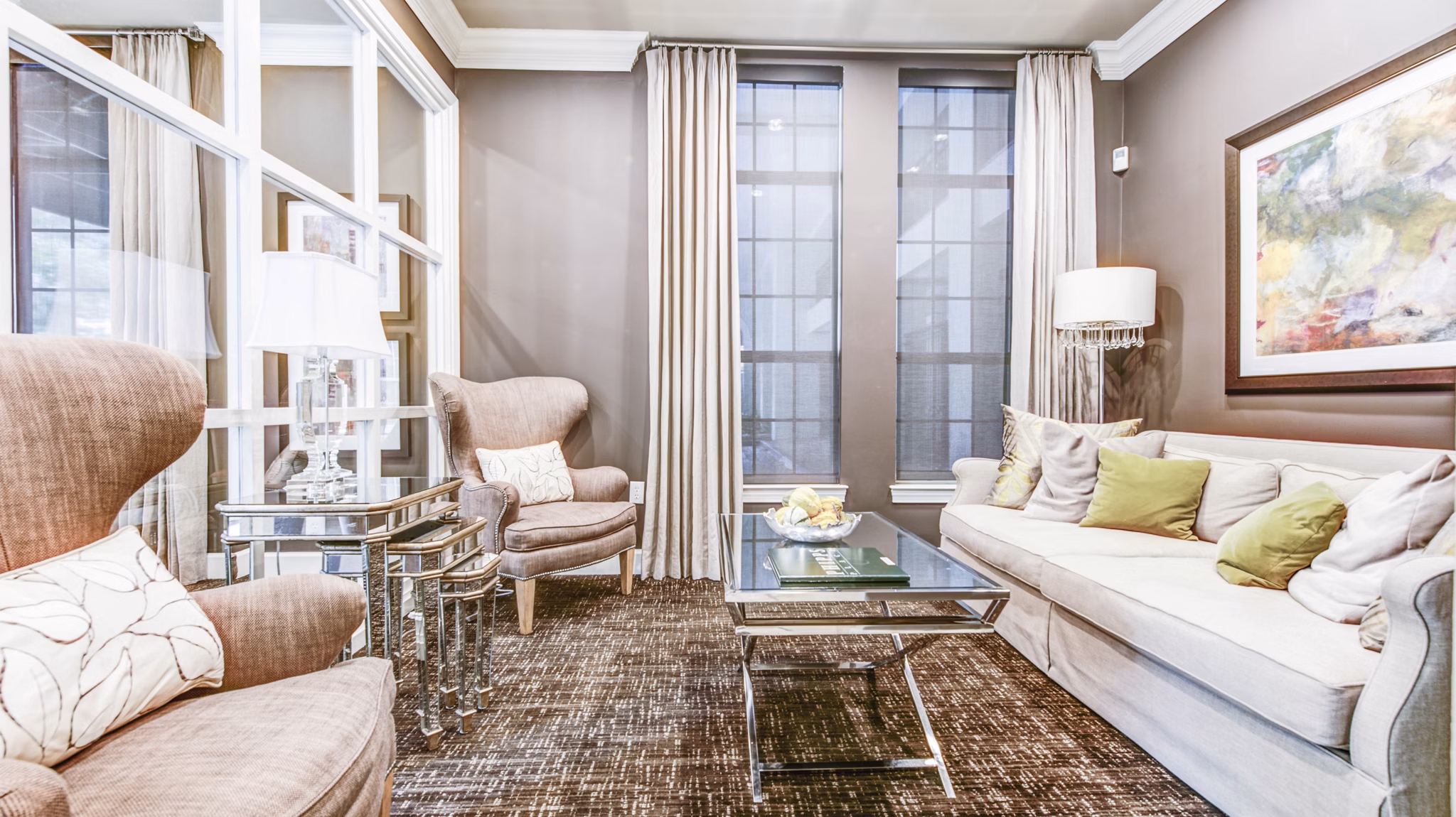 Clubhouse featuring modern design and seating at Phipps Place Apartments