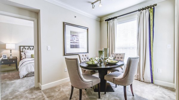 Dining area with modern decor and elegant lighting at Phipps Place Apartments, Greystar luxury apartments in an upscale neighborhood