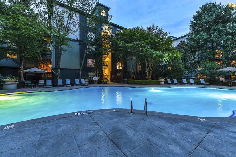 Luxurious poolside at Phipps Place Apartments with modern design and city views