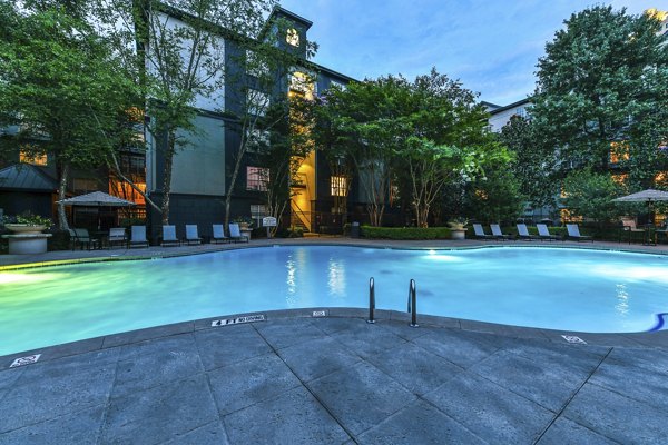 Luxurious poolside at Phipps Place Apartments with modern design and city views
