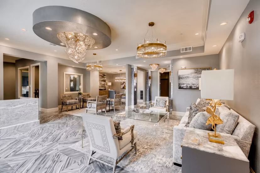 Elegant clubhouse with wood accents at The Caroline Apartments offering luxury spaces for social gatherings and events