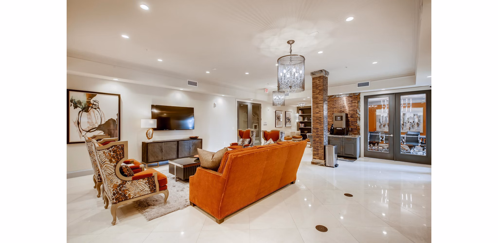 Luxurious clubhouse at The Caroline Apartments featuring modern seating and spacious design in a vibrant community setting
