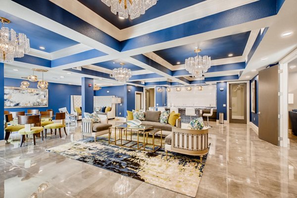 Elegant clubhouse with modern seating and lighting at The Caroline Apartments