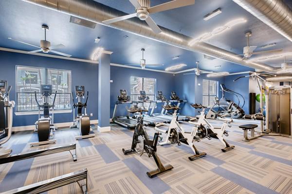 fitness center at The Caroline Apartments