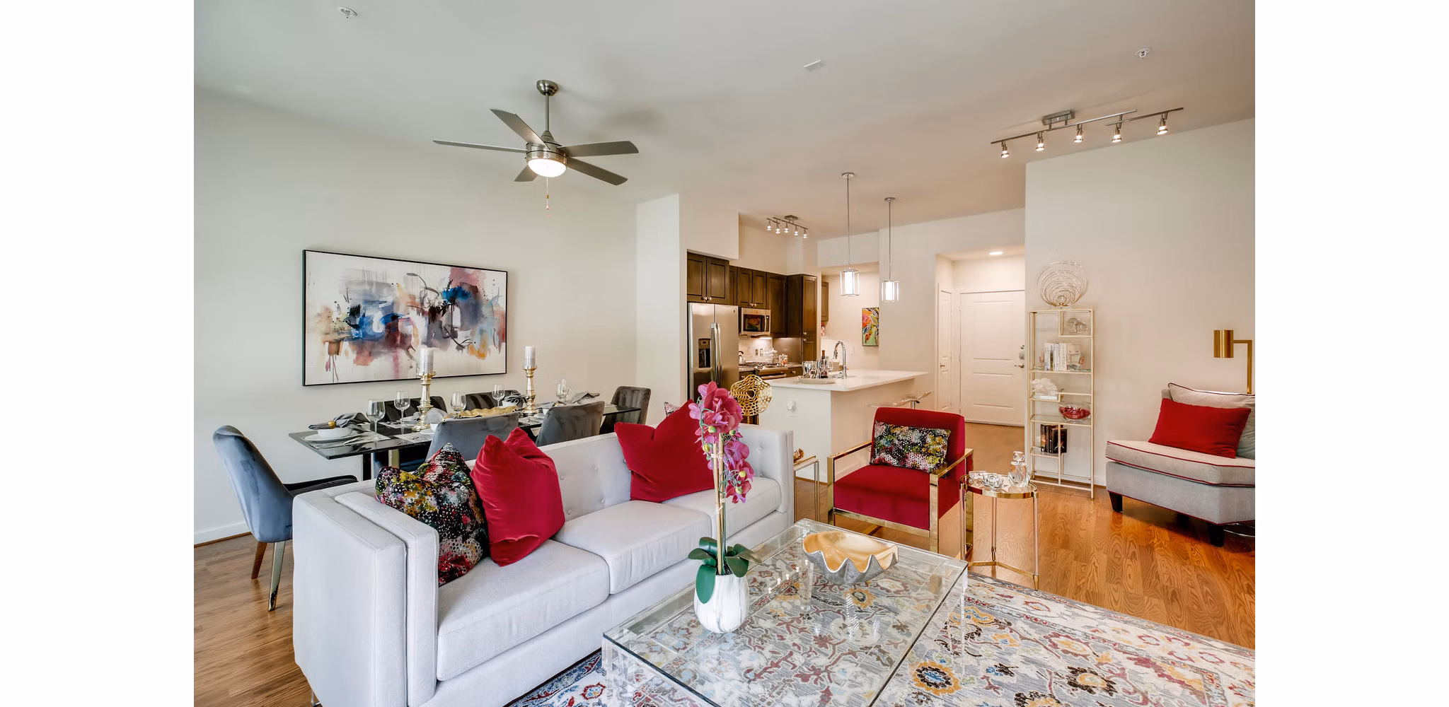 Spacious living room with modern decor at The Caroline Apartments