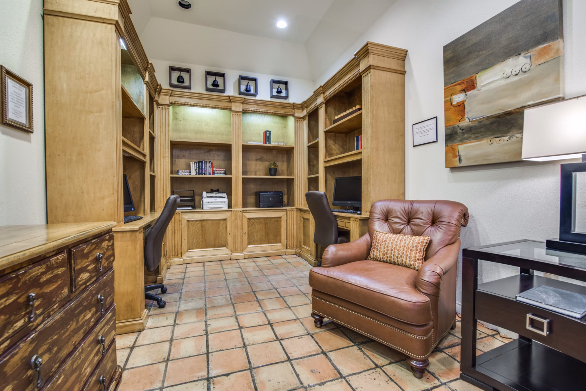 Business center with modern workstations at The Creole on Yorktown Apartments