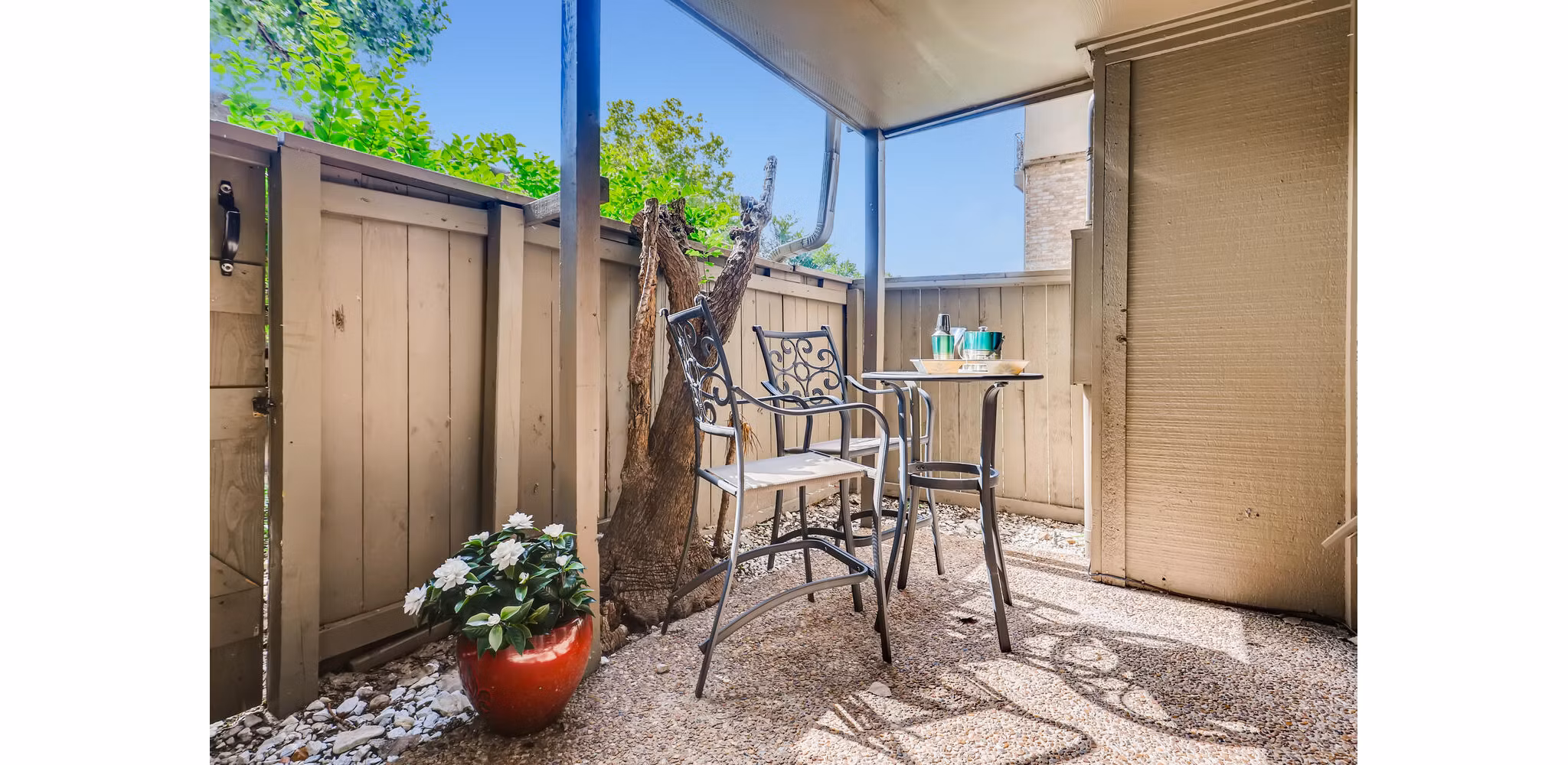The Creole on Yorktown: Chic patio with modern furnishings at luxury apartments