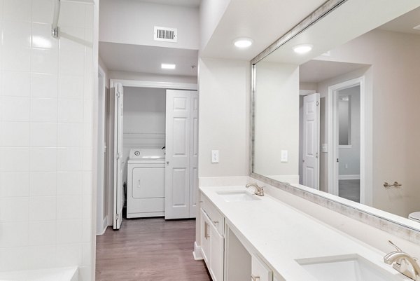 Modern bathroom with sleek fixtures at The Park at Armand Bayou Apartments