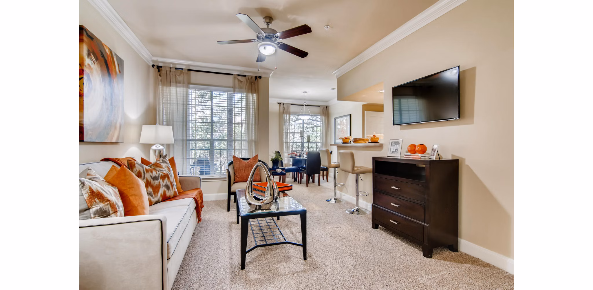 Spacious living room with modern decor at The Park at Armand Bayou Apartments