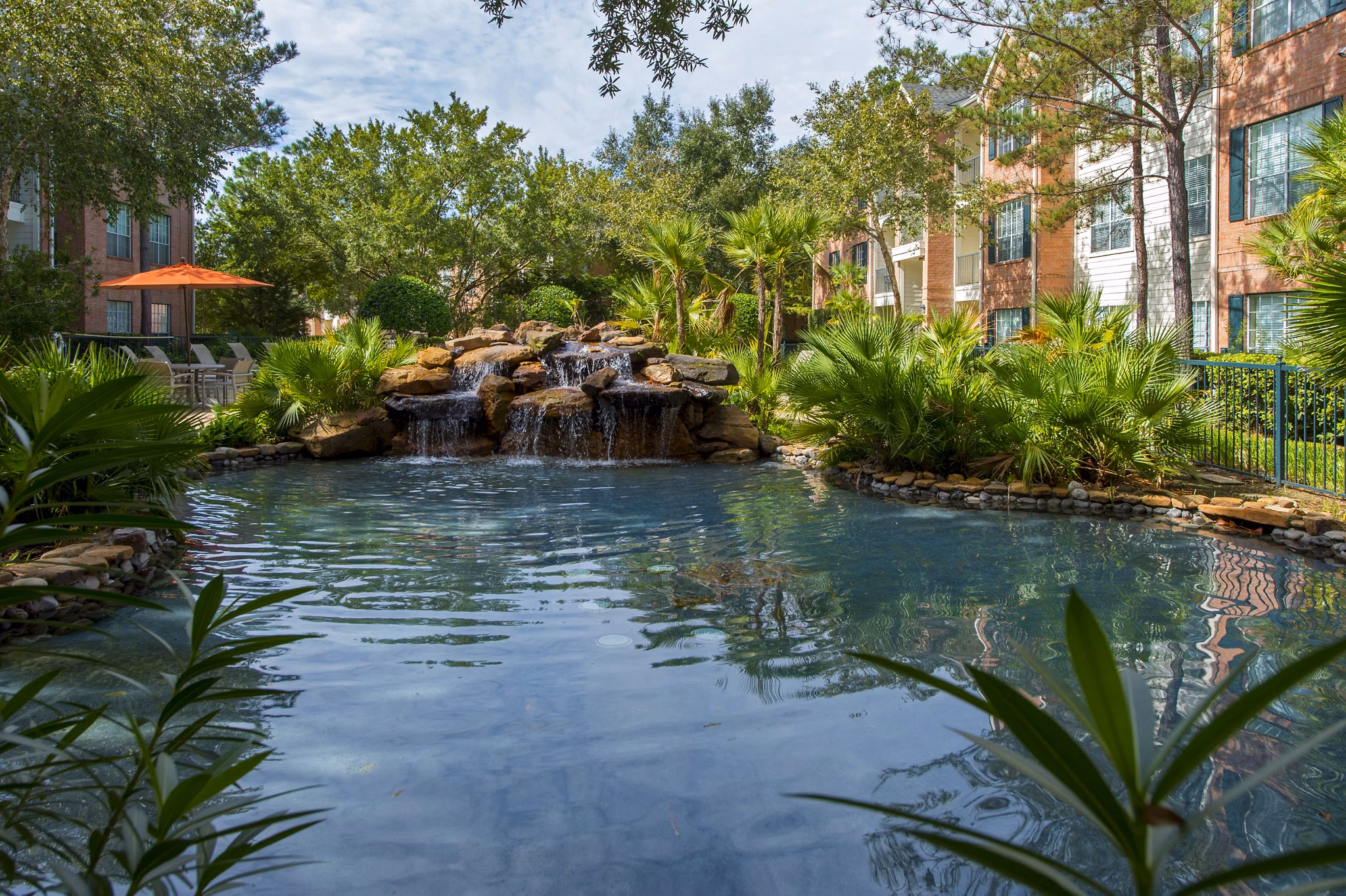 The Park at Armand Bayou: Tranquil suburban neighborhood view of luxury apartments in a lush setting