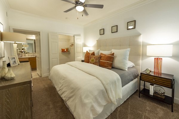 Cozy bedroom with modern decor at The Park on Memorial Apartments