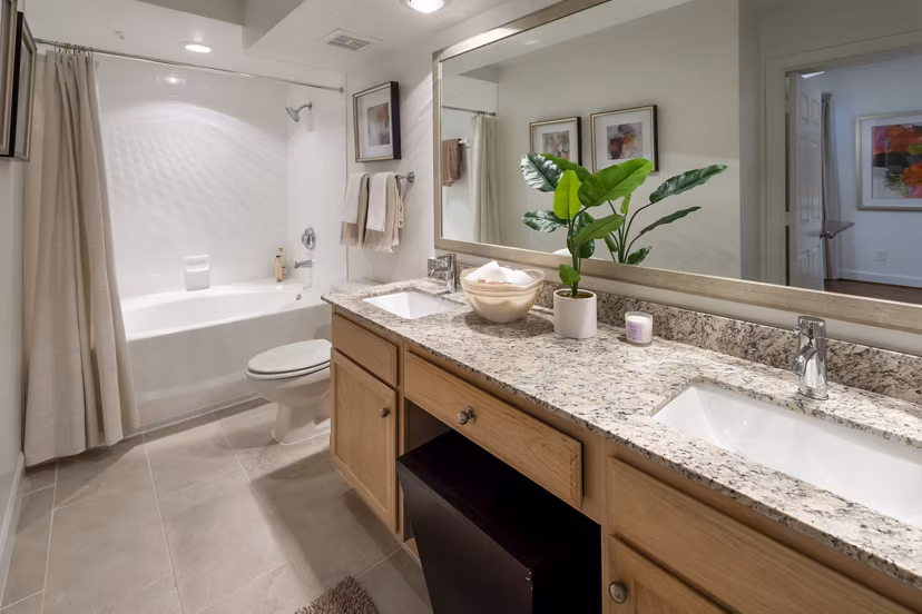 Luxurious bathroom with modern fixtures at The Park on Memorial Apartments