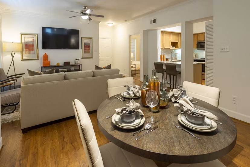 Dining area featuring modern furnishings and elegant lighting at The Park on Memorial Apartments Perfect for entertaining or casual meals
