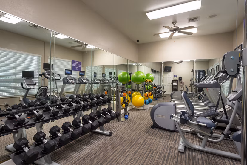 Fitness center with modern gym equipment at The Park on Memorial Apartments