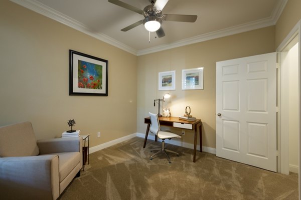 Modern kitchen with granite countertops at The Park on Memorial Apartments