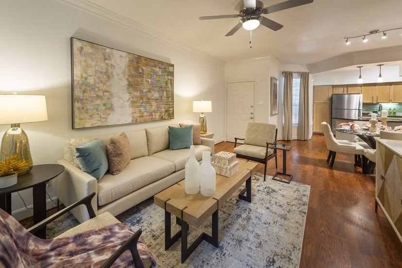 Spacious living room with modern decor in The Park on Memorial Apartments