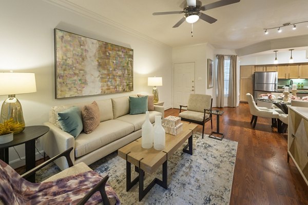 Spacious living room with modern decor in The Park on Memorial Apartments