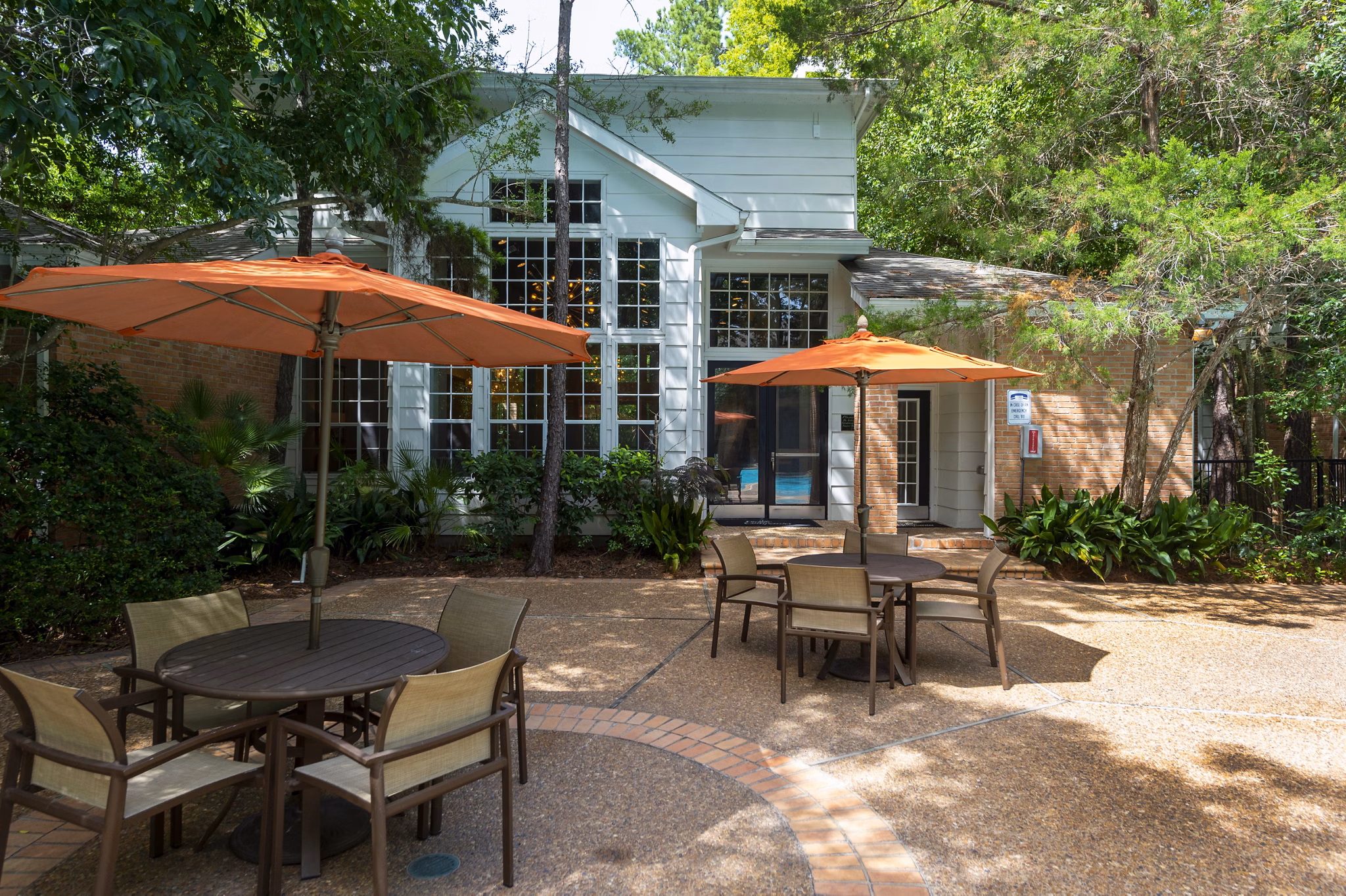Outdoor patio with modern seating at The Park on Memorial Apartments, ideal for relaxation and socializing in a vibrant community setting