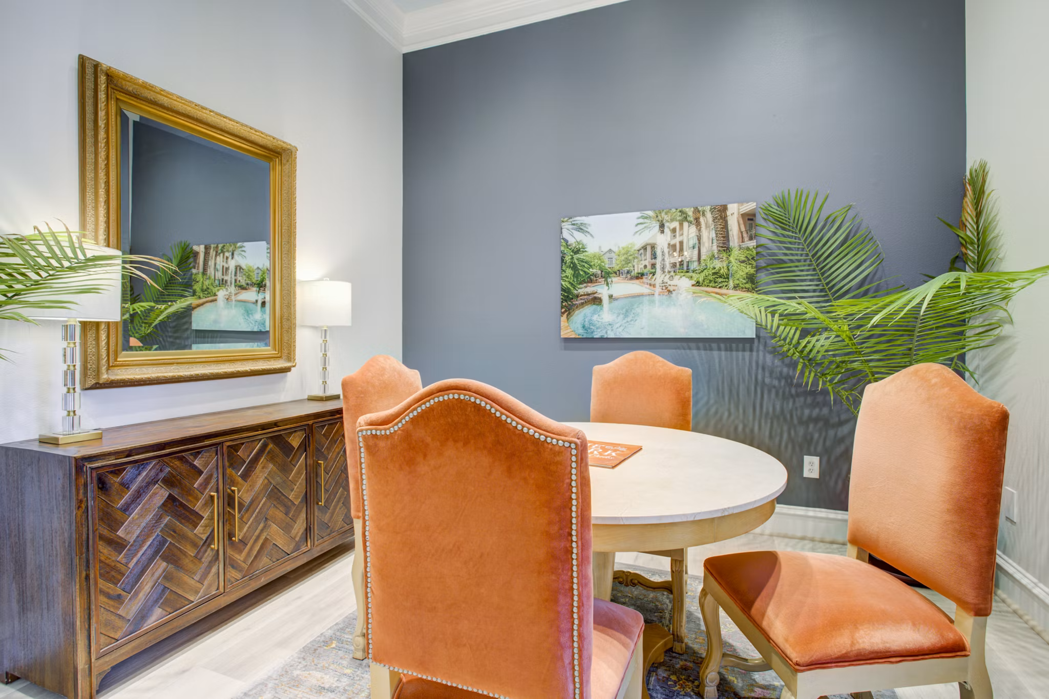 Modern clubhouse with cozy seating and fireplace at Park at River Oaks Apartments